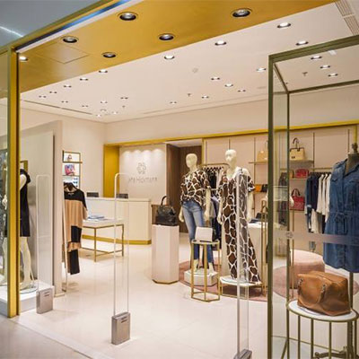 Thiết kế nội thất fashion shop với màu nhấn là ánh vàng đồng