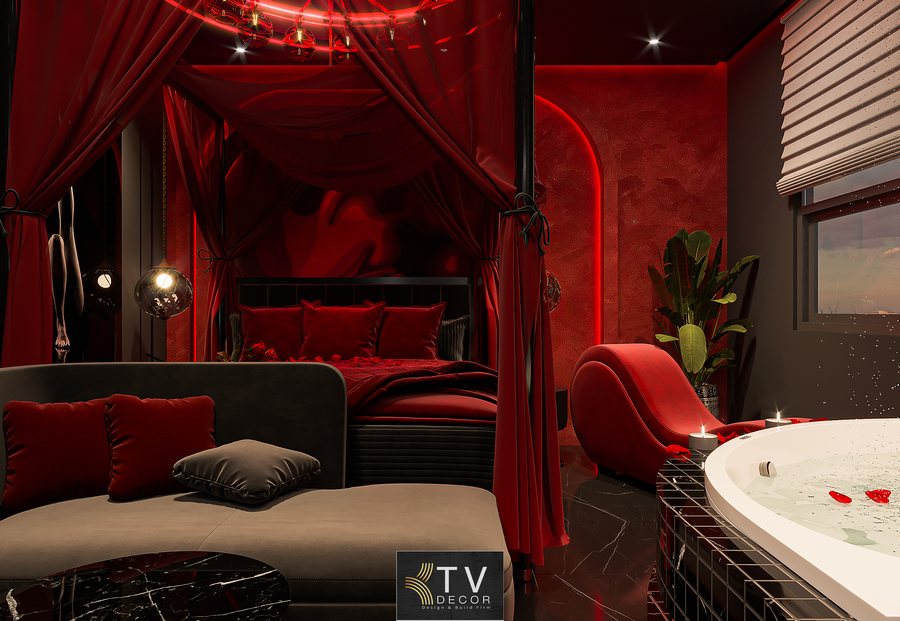 Không gian phòng khách sạn được thiết kế theo phong cách hiện đại – luxury với tông màu đỏ và đen chủ đạo, tạo cảm giác sang trọng, cá tính và đầy cuốn hút.