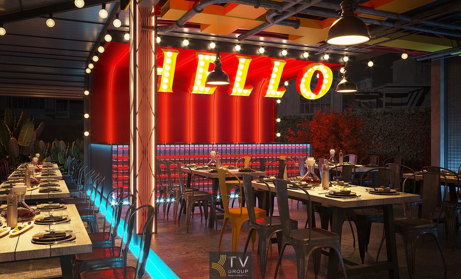 Không gian nhà hàng – beer garden được thiết kế hiện đại với mái che kim loại, hệ đèn treo trang trí và bàn ghế bố trí gọn gàng, tạo cảm giác sôi động nhưng vẫn thoáng đãng, phù hợp tổ chức sự kiện, ăn uống và giải trí về đêm.