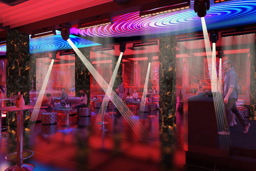 Mẫu Lounge Bar hiện đại tại TPHCM nổi bật với trần LED chuyển động, quầy bar trung tâm và ánh sáng sân khấu tạo không khí sôi động. 