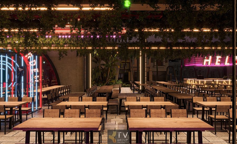 Không gian Beer Garden ban đêm lung linh phù hợp mô hình F&B Sài Gòn Thiết kế giàn thép Beer Garden kết hợp cây xanh treo tạo điểm nhấn